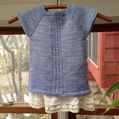 Raglan top with eyelet cables