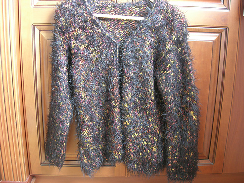 # 25 Kurze Jacke mit 3/4-Trompetenärmeln