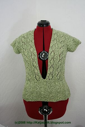 6291 Grüner Pulli mit Lochmuster