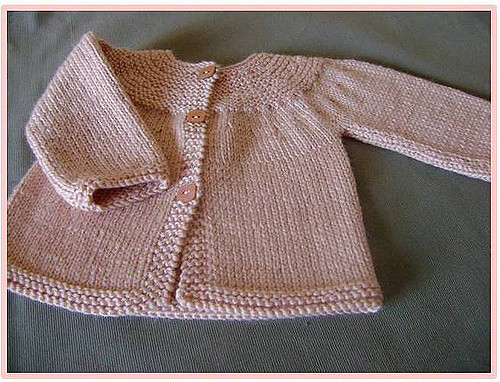 Le cardigan à empiècement arrondi 