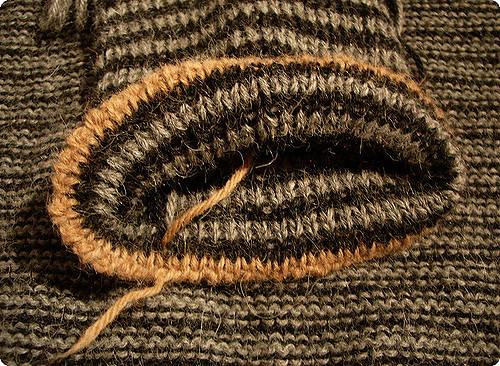 # 38 Gestreifter Herrenpulli