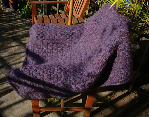 Ravelry: Surrounded Afghan and Lap Robe pattern by Susan Rainey