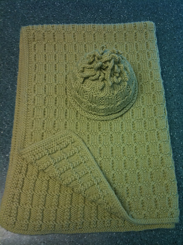 Ravelry: Surrounded Afghan and Lap Robe pattern by Susan Rainey