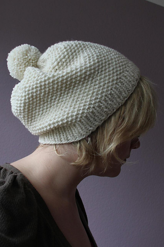pompon and seeds hat