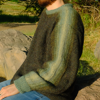 Masculine fit size XL. Wearer is 6'2" with 38" chest.