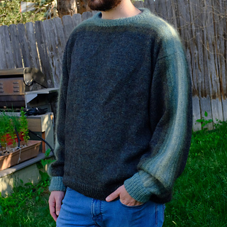 Masculine fit size XL. Wearer is 6'2" with 38" chest.