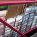 Bannister storage solution for the woolly overflow at Art and Craft Valley. 