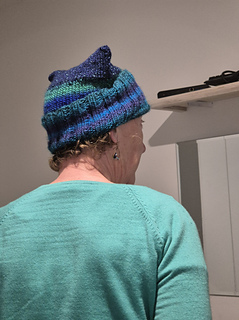 Folded brim. False side seam for shaping. 