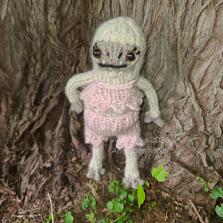 Yeti and outfit both knit with Lion Brand Wool ease and 3.5mm needles