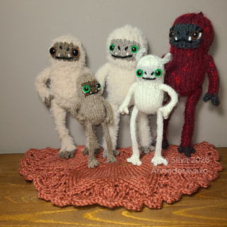 Yeti party! All yetis are knit with the same pattern. Only the yarn and needles change to resize them