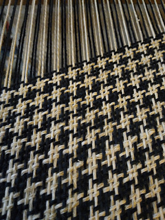 Yikes, that diagonal! I could only advance the warp by a couple of centimetres at a time, or I couldn't beat the weft on one side -- and I could barely fit the shuttle through on the other side! 