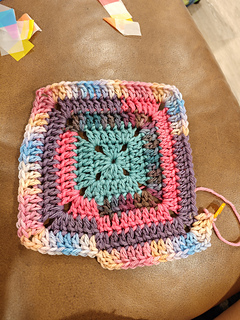 This is all the yarn left from the 6 skeins. Karma barely had 4 inches left so it didn't make it into the test square. This is going in the wash to test how it holds up