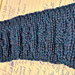 Blue/green/purple headband with varied rows of ribbing