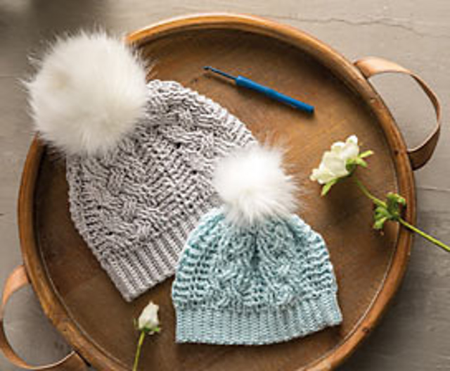 Ravelry Top Spot Mommy & Me Cable Stitch Hats pattern by Hobby Lobby