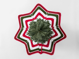 Classic Cable Star Christmas Tree Skirt made with Sprightly Acrylic Yarn