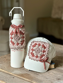 Pictured is a variation of the open handled version in Yarn Bee Soft & Sleek.