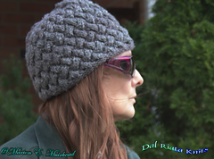 This silver ombre beanie is worked in Bernat Wavelength, yarn described by the manufacturer as "bulky" but I would call it "aran weight". This is a very thick warm beanie.