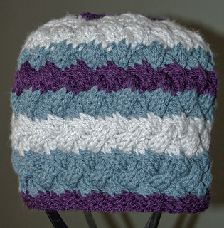 The Cable Weave Beanie with stripes of both four and eight rows makes a great stash buster.  It required a total of 176 yards of Loops & Threads Impeccable.