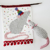 This pattern does not include instructions for the crochet rat plushie shown in photos.