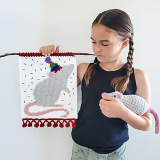 This pattern does not include instructions for the crochet rat plushie shown in photos.