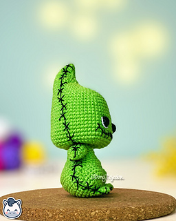 Handmade Oogie Boogie amigurumi inspired by Tim Burton’s The Nightmare Before Christmas, a perfect crochet pattern for Halloween fans and Disney lovers.