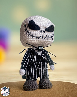 Handmade Jack Skellington amigurumi inspired by Tim Burton’s The Nightmare Before Christmas, spooky Halloween crochet pattern PDF.