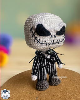 Handmade Jack Skellington amigurumi inspired by Tim Burton’s The Nightmare Before Christmas, spooky Halloween crochet pattern PDF.