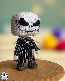 Handmade Jack Skellington amigurumi inspired by Tim Burton’s The Nightmare Before Christmas, spooky Halloween crochet pattern PDF.
