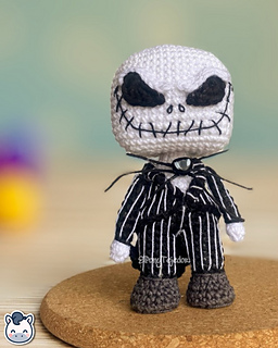Handmade Jack Skellington amigurumi inspired by Tim Burton’s The Nightmare Before Christmas, spooky Halloween crochet pattern PDF.