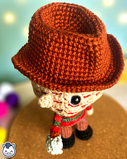 Handmade Freddy Krueger amigurumi inspired by Wes Craven’s A Nightmare on Elm Street, spooky Halloween crochet pattern PDF.