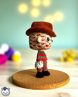 Handmade Freddy Krueger amigurumi inspired by Wes Craven’s A Nightmare on Elm Street, spooky Halloween crochet pattern PDF.
