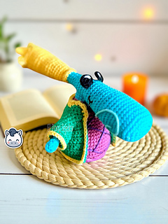 Handmade Rayman amigurumi inspired by Ubisoft’s iconic video game series, a perfect geeky crochet pattern PDF for fans of retro platform games.