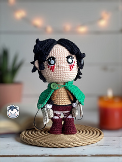 Handmade Eren Jaeger amigurumi inspired by Hajime Isayama’s Attack on Titan (Shingeki no Kyojin), a perfect crochet pattern for anime fans, otaku collections, and Funko-style plush lovers.