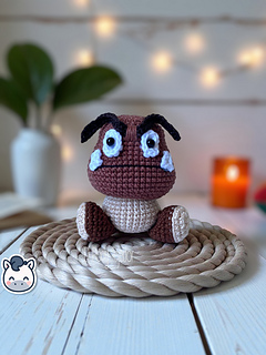 Handmade Goomba amigurumi inspired by Nintendo’s Super Mario Bros, a cute geek crochet pattern PDF perfect for retro video game fans and collectors.