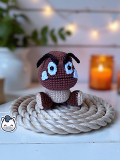 Handmade Goomba amigurumi inspired by Nintendo’s Super Mario Bros, a cute geek crochet pattern PDF perfect for retro video game fans and collectors.