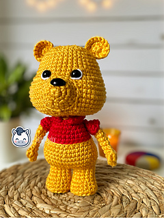 Handmade Winnie the Pooh amigurumi inspired by Disney’s classic character from the Hundred Acre Wood, cute crochet pattern PDF perfect for Disney and kawaii fans.
