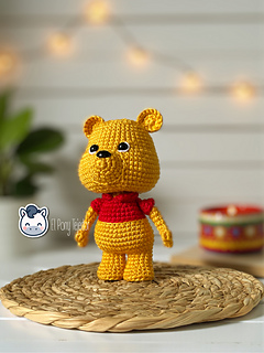 Handmade Winnie the Pooh amigurumi inspired by Disney’s classic character from the Hundred Acre Wood, cute crochet pattern PDF perfect for Disney and kawaii fans.