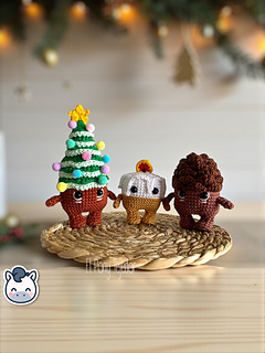 Handmade Christmas amigurumi set inspired by classic holiday ornaments, featuring a Christmas tree, festive candle and pinecone, perfect Christmas crochet pattern PDF for fans of winter decor and handmade holiday crafts.