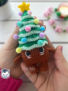 Handmade Christmas amigurumi set inspired by classic holiday ornaments, featuring a Christmas tree, festive candle and pinecone, perfect Christmas crochet pattern PDF for fans of winter decor and handmade holiday crafts.