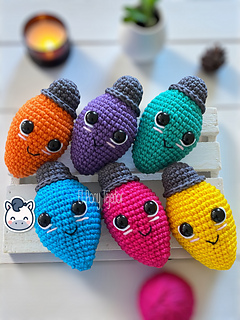 Handmade Christmas light string amigurumi inspired by cozy holiday decor, colorful kawaii Christmas crochet pattern PDF.