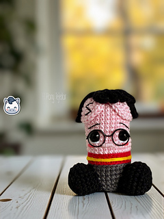 Handmade Harry Potter inspired amigurumi penis with round glasses and Gryffindor style scarf, funny geek crochet pattern PDF.