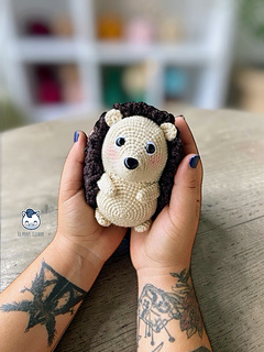 Handmade African hedgehog amigurumi crochet pattern, a cute and geeky plush design perfect for animal lovers and crochet fans.