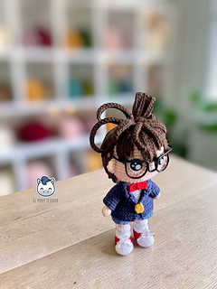 Detective Conan amigurumi crochet doll with glasses and blue jacket, handmade anime plush pattern PDF, geek amigurumi toy for manga and anime fans, kawaii crochet character design