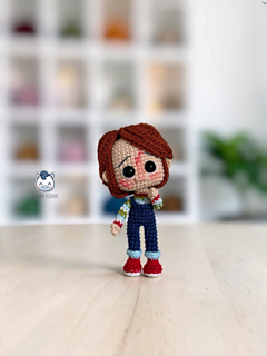Handmade Chucky amigurumi inspired by the Child's Play horror movies, a detailed crochet PDF pattern featuring step-by-step instructions, perfect for Halloween, horror movie fans, and handmade doll collectors.