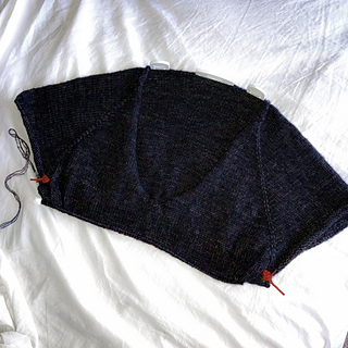 12 inches from back of neck to live stitches, about an inch of underarm knit. Just joined my 2nd skein of single-ply fingering.