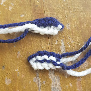 Knitted manta ray mouth pieces before sewing
