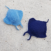 Knitted manta ray couple travel companions