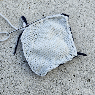 Sewing up the knitted manta ray