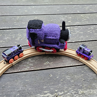 Knitted train as part of Charlie toy train collection