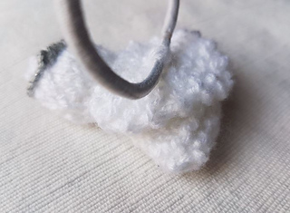 Little knitted angel hairband